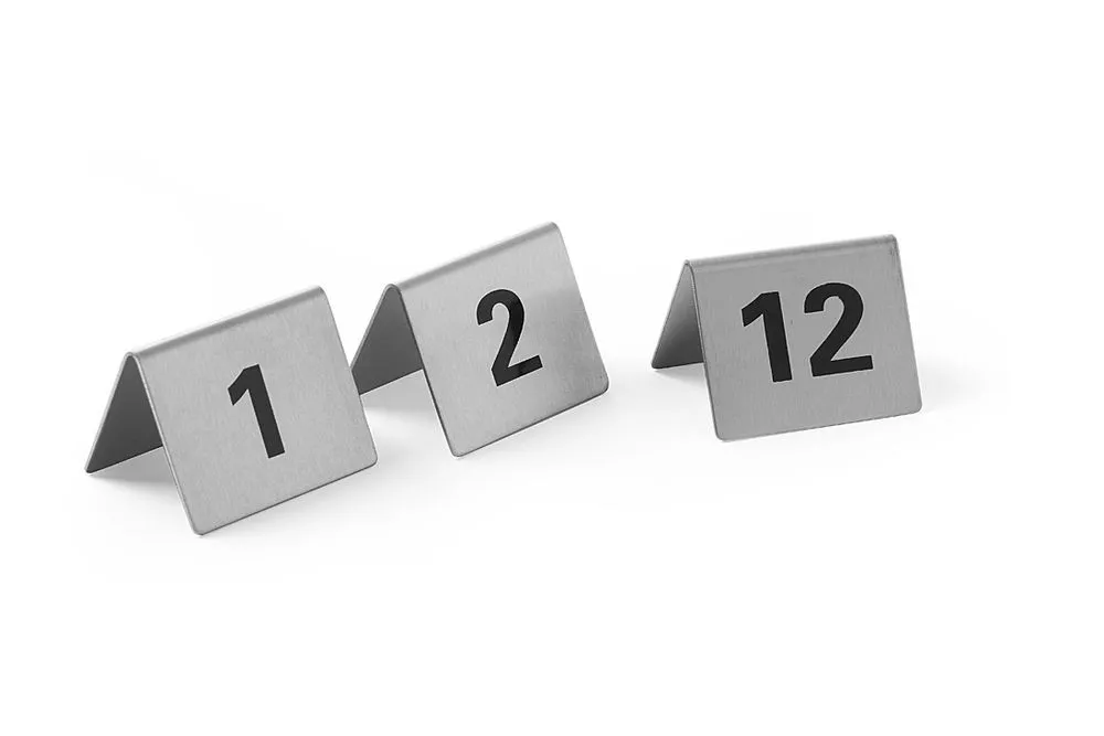 12 stalo lentynų numeruoti nuo 1 iki 12.